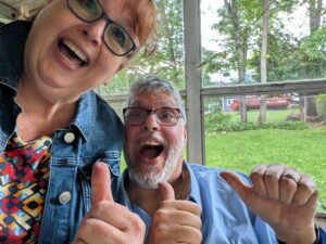 Wayne Zuhl and his wife celebrating after their offer on their home was accepted
